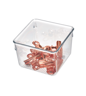 A clear, square LINUS drawer organizer HIGH by iDesign holds several metallic copper clips, seen from above on a white background.