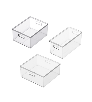 Three BNB x VCN storage containers with lids KLAR in various sizes and shapes, including two large and one extra-long, smaller container, are stacked with integrated handles on a white background.